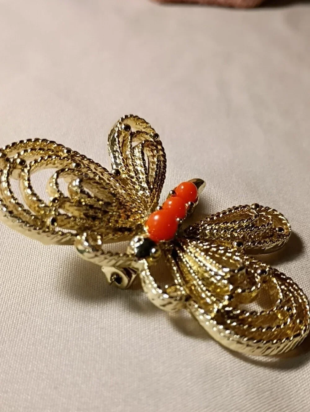 Gold-Tone Butterfly Brooch with Bright Orange Cabochons